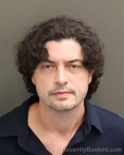 Mugshot of RYAN STUART MULLICAN booked in Orange County, Florida on June 15, 2026