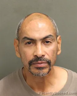 Mugshot of SANTOS GARCIA booked in Orange County, Florida on June 18, 2026