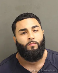 Mugshot of CRISTIAN JOSE AVILES booked in Orange County, Florida on June 20, 2026