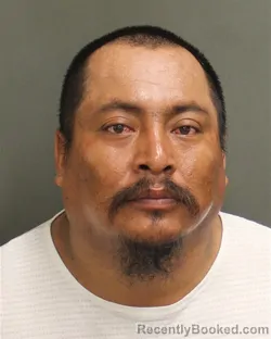 Mugshot of MANUEL RODOLFO CALELGONZALEZ booked in Orange County, Florida on June 21, 2026