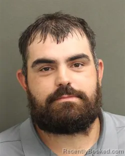 Mugshot of TYLER LANE COGBURN booked in Orange County, Florida on June 22, 2026