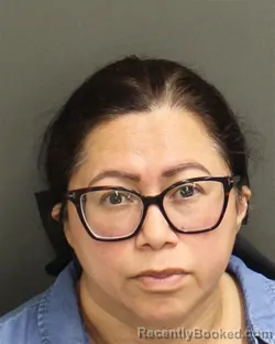 Mugshot of ELIZABETH GOMEZ booked in Orange County, Florida on June 22, 2026