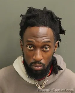 Mugshot of KWAME JAMAL MOSS booked in Orange County, Florida on June 23, 2026