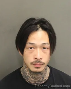 Mugshot of ALLEN YULIN JI booked in Orange County, Florida on June 23, 2026