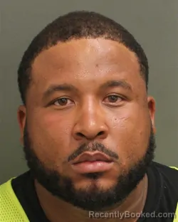 Mugshot of MALIK MOTON booked in Orange County, Florida on June 23, 2026