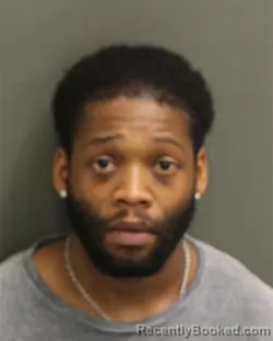 Mugshot of MALIK DJAHNNEL BURLEY booked in Orange County, Florida on June 24, 2026