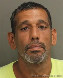 Mugshot of GUILLERMO FRANK FLORES booked in Orange County, Florida on June 24, 2026
