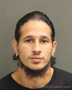 Mugshot of SAMUEL NIEVESORTIZ booked in Orange County, Florida on June 24, 2026