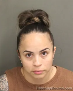 Mugshot of LUCIA CRUZ booked in Orange County, Florida on June 26, 2026