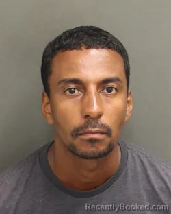 Mugshot of REYNALDO LUIS SANTIAGO booked in Orange County, Florida on July 4, 2026