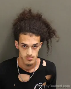 Mugshot of Joshua Mora booked in Orange County, Florida on July 23, 2026