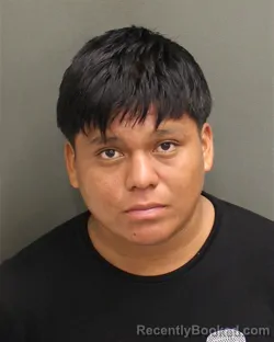 Mugshot of Julio Adan Godinezmendez booked in Orange County, Florida on July 25, 2026