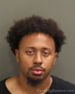Mugshot of Norelien Jean Kaycen booked in Orange County, Florida on July 25, 2026