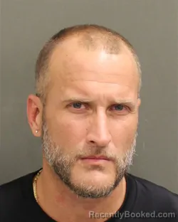 Mugshot of Erik David Bane booked in Orange County, Florida on July 25, 2026