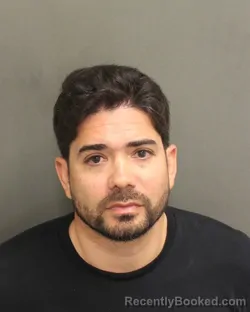 Mugshot of Alexander Jose Escalonaleon booked in Orange County, Florida on July 25, 2026