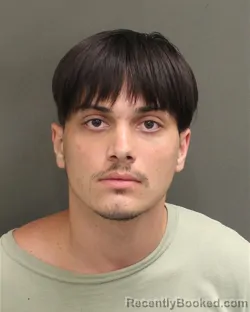 Mugshot of Ethan Troy Evans booked in Orange County, Florida on July 27, 2026
