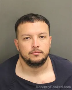 Mugshot of Maynor Miguel Cruz booked in Orange County, Florida on July 27, 2026