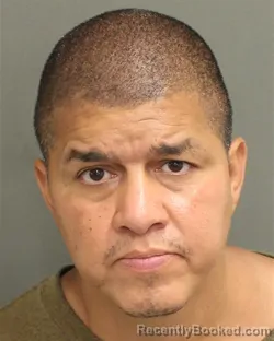 Mugshot of Lewis Fernando Rosado booked in Orange County, Florida on July 28, 2026