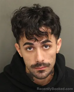 Mugshot of Cristian Anthony Vega booked in Orange County, Florida on July 28, 2026
