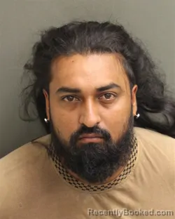 Mugshot of Yougindra Teeakram booked in Orange County, Florida on July 28, 2026