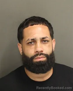 Mugshot of Justin Nino Serrano booked in Orange County, Florida on July 28, 2026