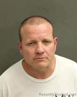 Mugshot of Christopher Arnold Knudsen booked in Orange County, Florida on July 29, 2026