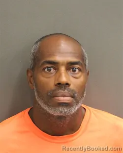 Mugshot of Manasseh Pujol Calvin booked in Orange County, Florida on July 30, 2026