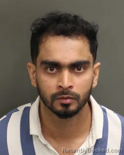 Mugshot of Abdullah Al Zubayer booked in Orange County, Florida on July 30, 2026