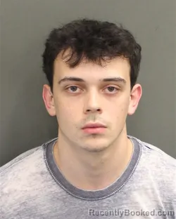 Mugshot of Aden Paul Bell booked in Orange County, Florida on July 30, 2026