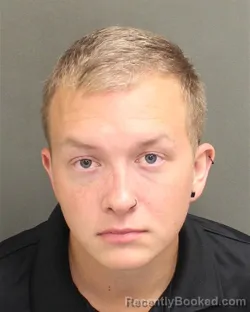 Mugshot of EVAN LEE MANLICK booked in Orange County, Florida on July 31, 2026