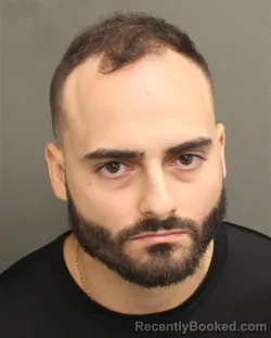 Mugshot of Miguel Ernesto Mendoza booked in Orange County, Florida on July 31, 2026
