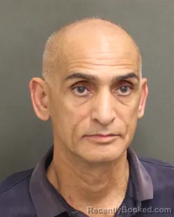 Mugshot of Cyrus Nowiapahlavi booked in Orange County, Florida on July 31, 2026