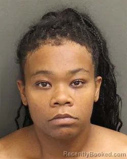 Mugshot of Alexis Britannya Burke booked in Orange County, Florida on August 1, 2026