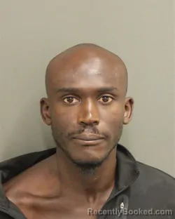 Mugshot of Askia Cheikh Ndiaye booked in Orange County, Florida on August 2, 2026
