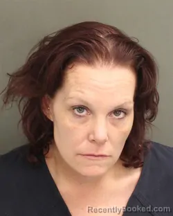 Mugshot of Kimberlee Ann Belonge booked in Orange County, Florida on August 2, 2026