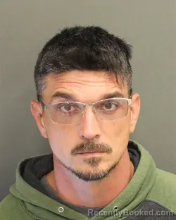 Mugshot of John Andrew Swarner booked in Orange County, Florida on August 6, 2026