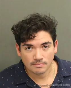 Mugshot of Carlos Alfredo Castillo Saez booked in Orange County, Florida on August 7, 2026