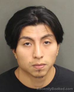 Mugshot of Dario Izaack Chavez Ramirez booked in Orange County, Florida on August 8, 2026
