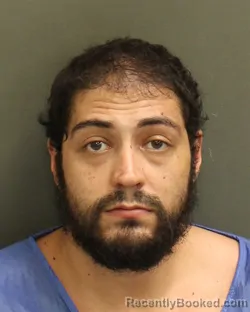 Mugshot of Desi Ricardo Alvarez booked in Orange County, Florida on August 9, 2026