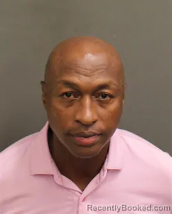 Mugshot of John Kyama Mbiti booked in Orange County, Florida on August 9, 2026