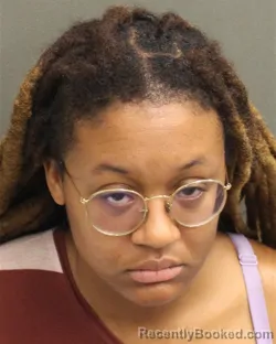 Mugshot of Alyssa Briana Dotson booked in Orange County, Florida on August 9, 2026