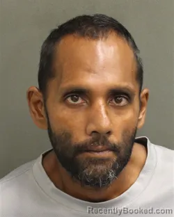 Mugshot of Karem Kevin Mohamed booked in Orange County, Florida on August 9, 2026