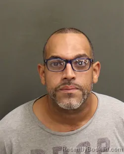 Mugshot of Alex Ronnie Collado booked in Orange County, Florida on August 10, 2026