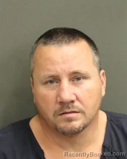 Mugshot of Justin Benjamin Morey booked in Orange County, Florida on August 10, 2026