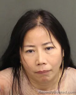 Mugshot of Junrong Zhang booked in Orange County, Florida on August 10, 2026