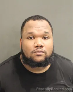 Mugshot of Koree Denzel Hughes booked in Orange County, Florida on August 11, 2026