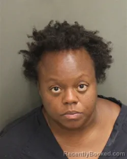 Mugshot of Yvonne Edith Otwoma booked in Orange County, Florida on August 11, 2026