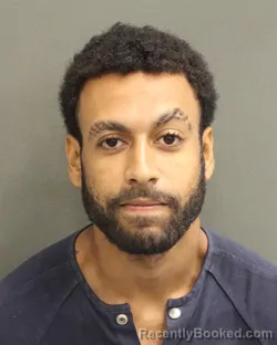 Mugshot of Justin Michael Garcia booked in Orange County, Florida on August 11, 2026