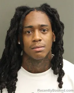 Mugshot of Taveon Thaddeous Givens booked in Orange County, Florida on August 12, 2026