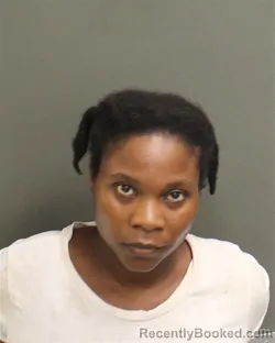 Mugshot of Anny Louis booked in Orange County, Florida on August 12, 2026